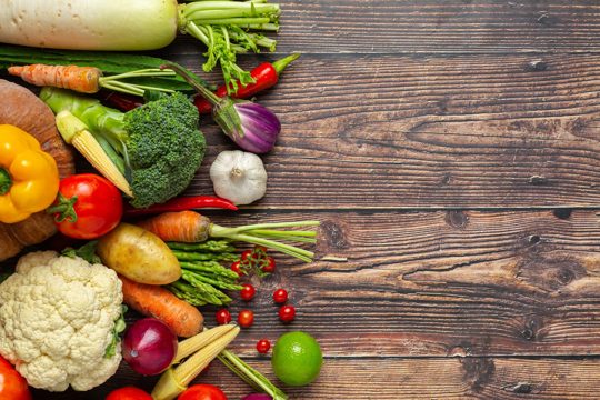 Healthy vegetables on wooden table