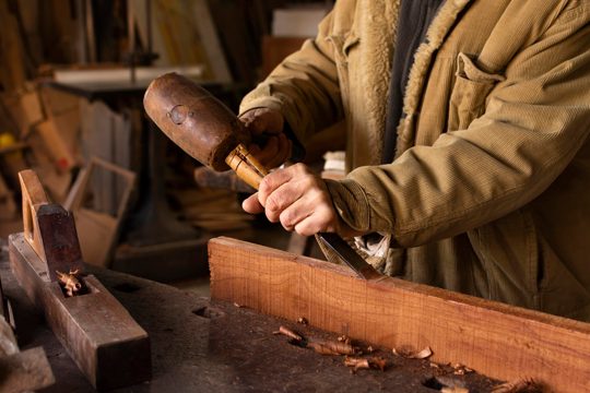 Carpenter working on woodworking
