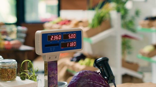 Modern grocery store scale in empty shop used in small business organic farming freshly harvested produce sustainable zero waste supermarket with natural organic fruits and vegetables close up