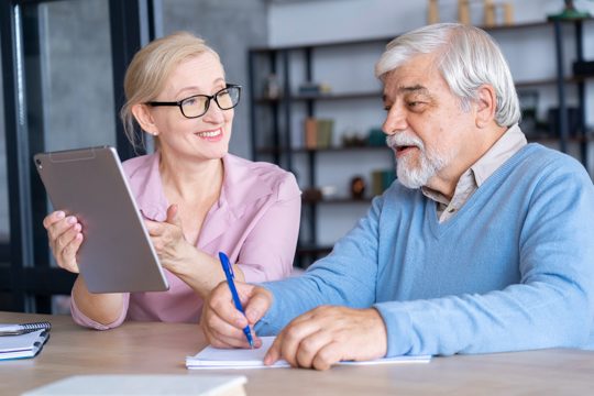 Close up on senior couple while learning